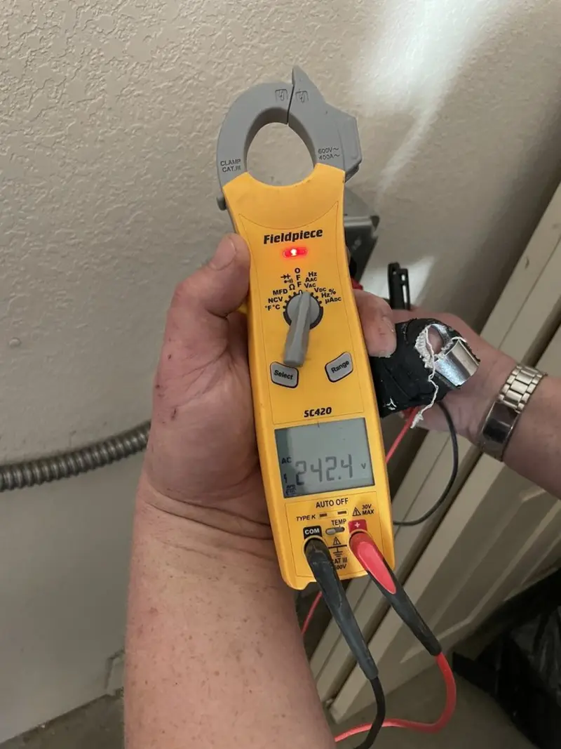 Voltage testing with clamp meter during Ceiling Fan Installation in Walterboro